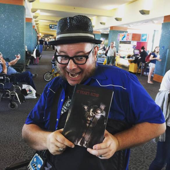 Nick Gucker carrying great reading material for the trip home